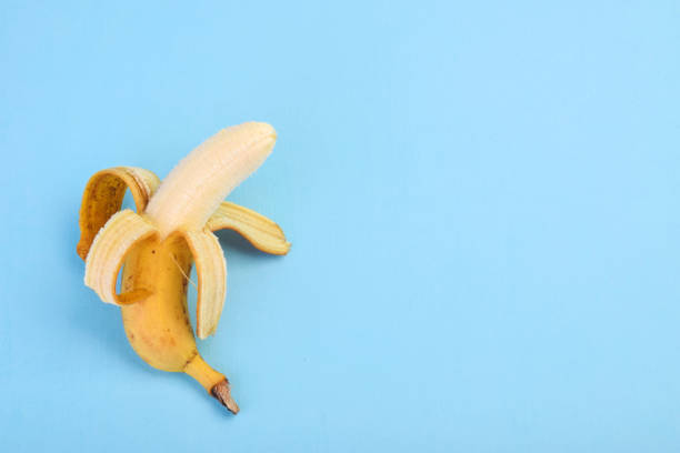 istock Banana on blue background top view 1136205618
