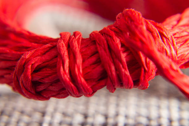 istock background texture of red rope with knot. concept and design 1136205856