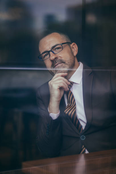 istock Handsome senior businessman with eyeglasses 1136206931