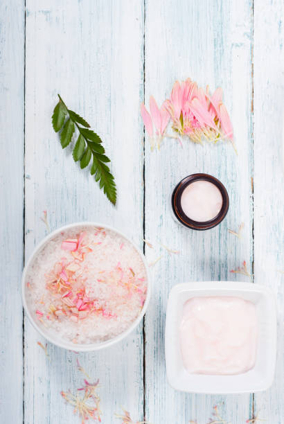 istock Cosmetics with pink petals 1136207926