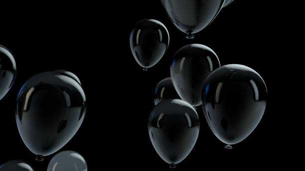 istock Black balloon floating in the air 1136210273