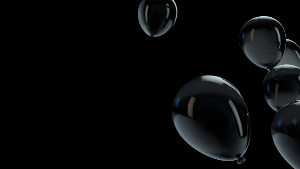 istock Black balloon floating in the air 1136210276
