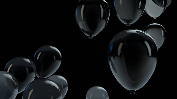 istock Black balloon floating in the air 1136210374
