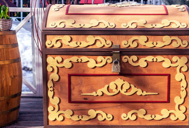 istock Wooden chest with lock and decorative ornament. 1136211670