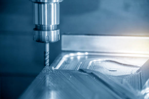istock The  CNC milling machine cutting the mould part with the solid ball end mill tool. 1136212297