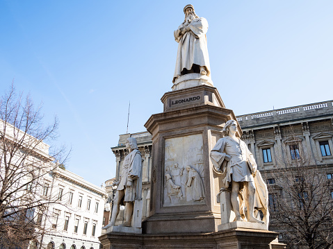 Travel to Italy - Monument of Leonardo da Vinci in Piazza della Scala in Milan city, Lombardy. The statue was erected at the square in 1872 by by Pietro Magni