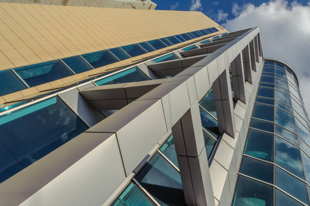 istock Frame building with mirrored walls against the sky with reflections 1136214457