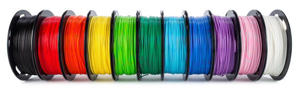 colorful bright wide panorama row of spool 3d printer filament colorful bright wide panorama row of spool 3d printer pla abs filament plastic material isolated on white background light bulb filament photos stock pictures, royalty-free photos & images