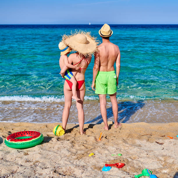 istock Family on beach in Greece 1136225269