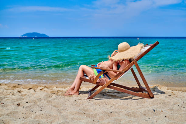 istock Toddler boy on beach with mother 1136225295