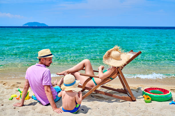 istock Family on beach in Greece 1136225303
