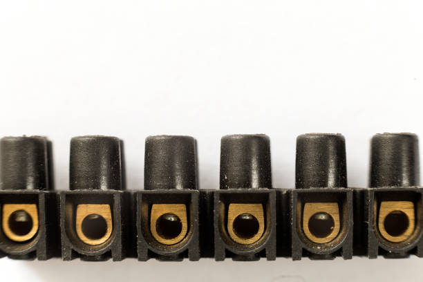 istock Terminal block electrical wires connector clips isolated on white copy space background. Electrician tools and equipment, cable connection concept. 1136226309