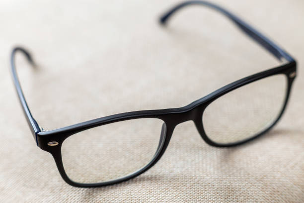 istock Reading spectacles, fashionable eyeglasses isolated on blurred white copy space background. 1136226327
