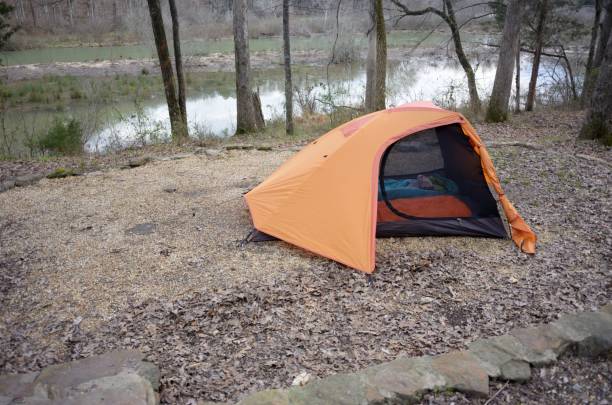 istock Camping tent near lake 1136227248