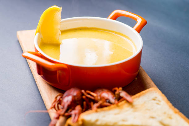 istock cream soup with croutons. unusual feed with crayfish 1136228940