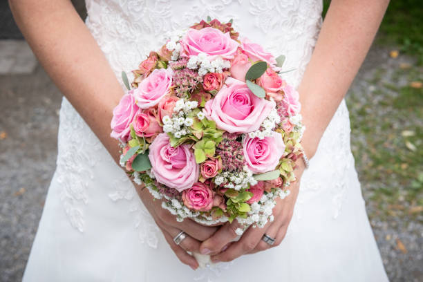 istock Bride holding her bridal bouquet 1136229114