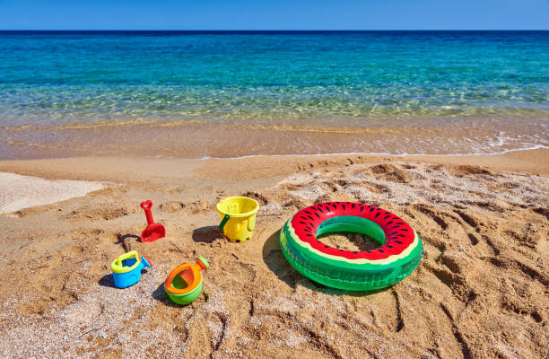 Beautiful beach with inflatable ring and toys in Sithonia, Greece