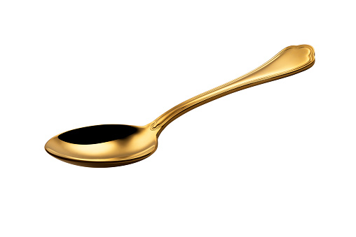 Empty Golden spoon isolated on white background