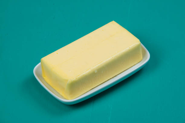 A piece of butter on a plate