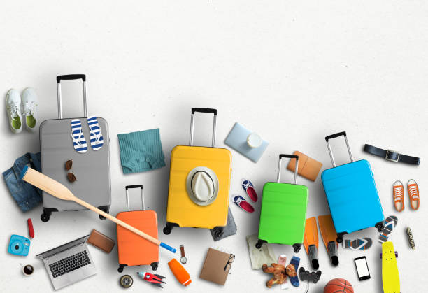 istock Family is going on a trip, five colored suitcases with clothes and accessories 1136232926