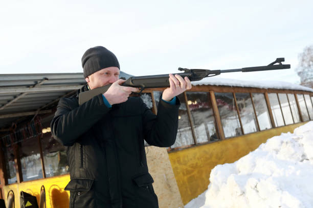 istock Person shoots air rifle 1136233755
