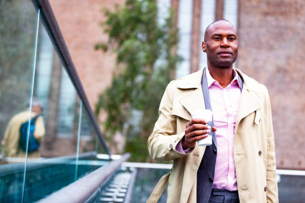istock Businessman Walking with Morning Coffee on the Bridge 1136233879