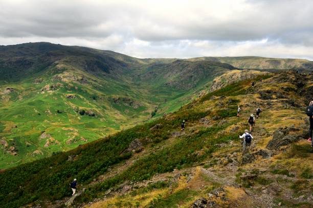 istock Line of walkers on Helm Crag 1136235042