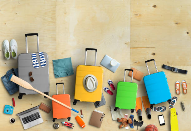 istock Family is going on a trip, five colored suitcases with clothes 1136235119