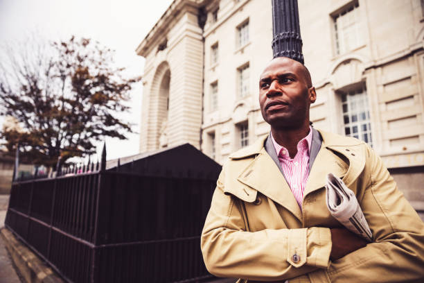 istock Business Executive Waiting for Cab Near Westminster Bridge 1136235871