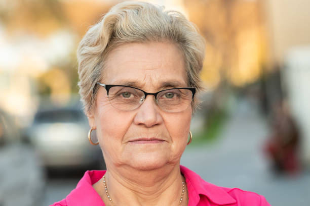 istock Serious senior woman looking at the camera 1136235897