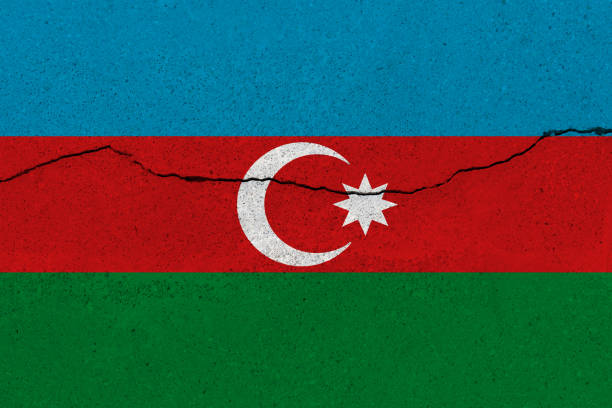 istock azerbaijan flag on concrete wall with crack 1136241677