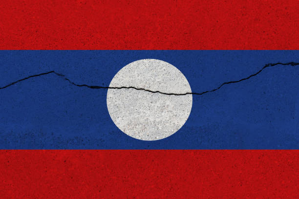 istock Laos flag on concrete wall with crack 1136241748