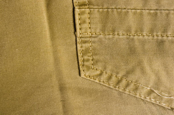istock clothing items washed cotton fabric texture with seams 1136241832