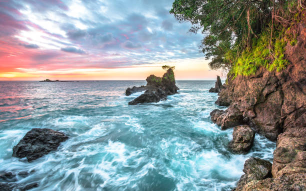 costa costarricense al atardecer - costa rican sunset fotos fotografías e imágenes de stock