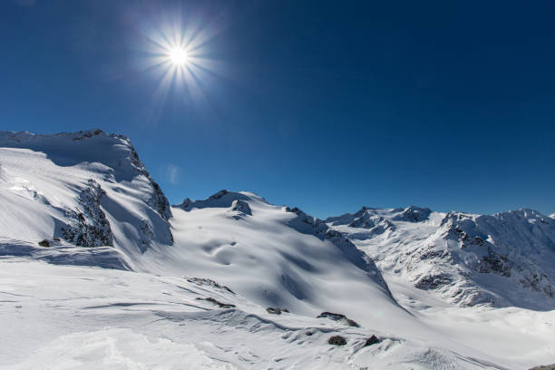 istock Solar day in Alps mountains 1136255081