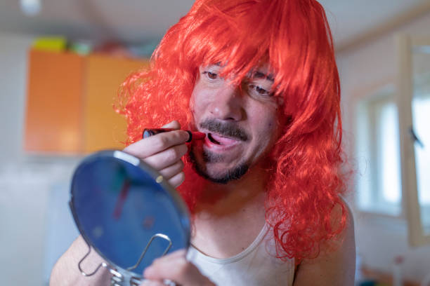 istock Bisexual Person Doing a Makeup at Home 1136255090