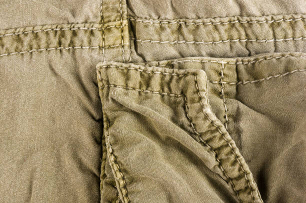 istock clothing items washed cotton fabric texture with seams 1136257988
