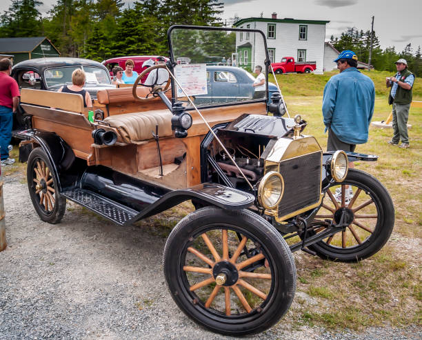 1915 Ford Model T truck Lake Charlotte, Nova Scotia, Canada - June 15, 2008: 1915 Ford Model T truck on display at Heritage Village Car Show, Lake Charlotte. People are stopping to view the classic cars on display. model t ford stock pictures, royalty-free photos & images