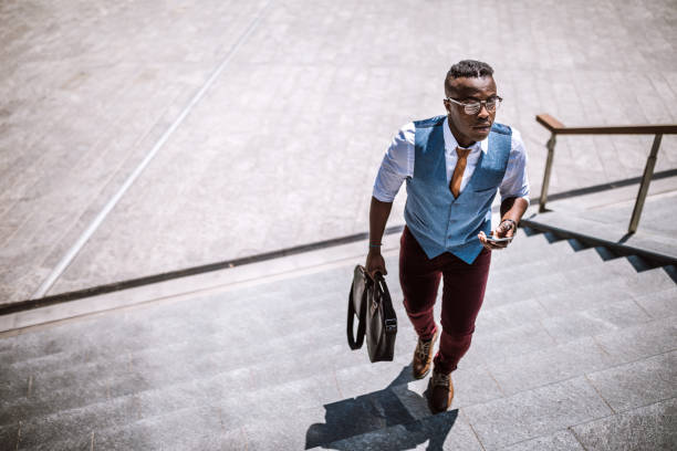 istock Businessman Stepping Into Railroad Station 1136261857