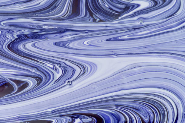 istock Abstract background for layouts. Unusual patterns close-up when mixing white and blue paint. Bright photo. 1136262449
