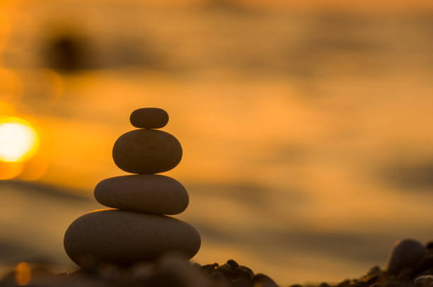 istock stack of zen stones on pebble beach 1136262460