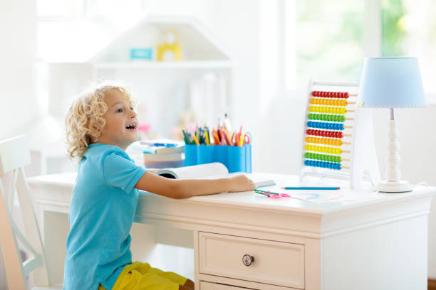 istock Child drawing. Kids paint. 1136274253