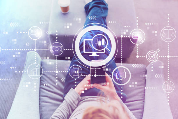 istock Stock trading concept with man using a smartphone 1136275125