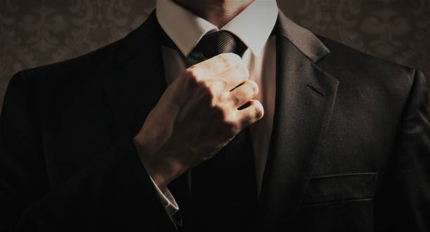 istock Businessman adjusting his look 1136275147