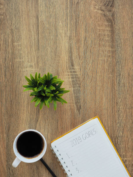 istock notebook 2019 goals for new year wooden 1136277763