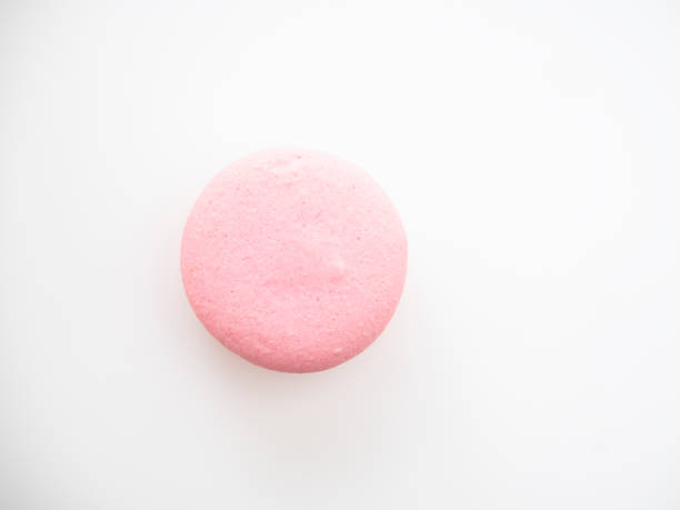 istock Sweet hazelnut Pink macaroon isolated on white background. 1136278623