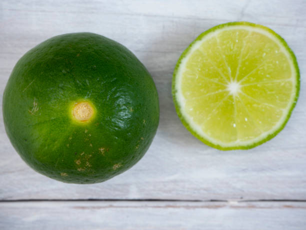 istock Fresh cuts organic lemon on wood table 1136279763