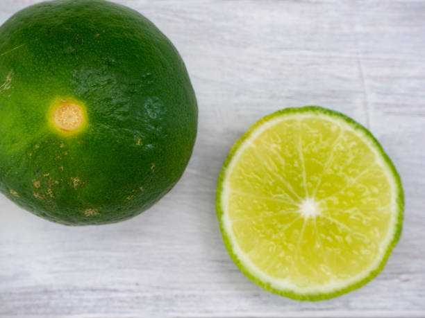 istock Fresh cuts organic lemon on wood table 1136279887