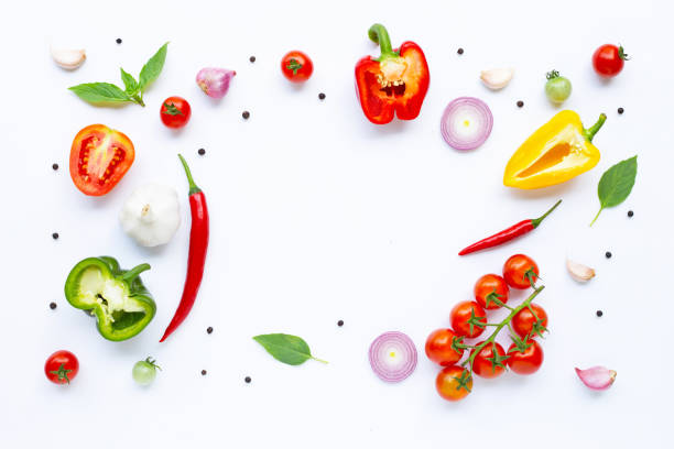 istock Various fresh vegetables and herbs on white background. Healthy eating concept 1136283173