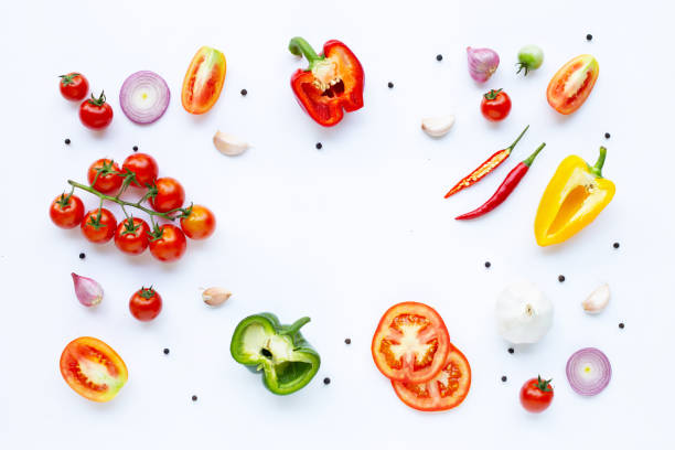istock Various fresh vegetables and herbs on white background. Healthy eating concept 1136283183